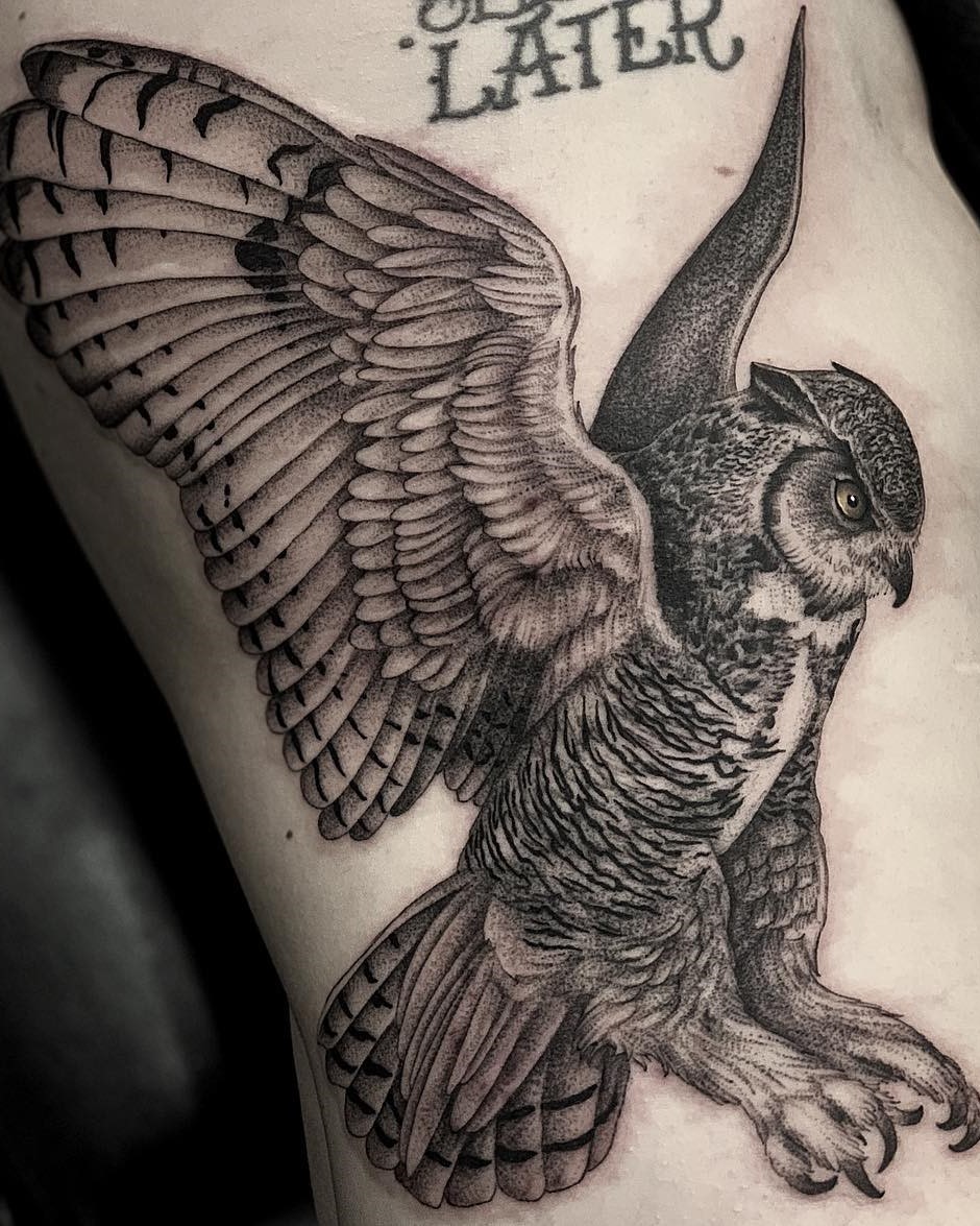 Owl Mid-Flight Side Rib Cage Tattoo in Black and Grey done by Tattoo Artist Alan Lott at Sacred Mandala Studio.